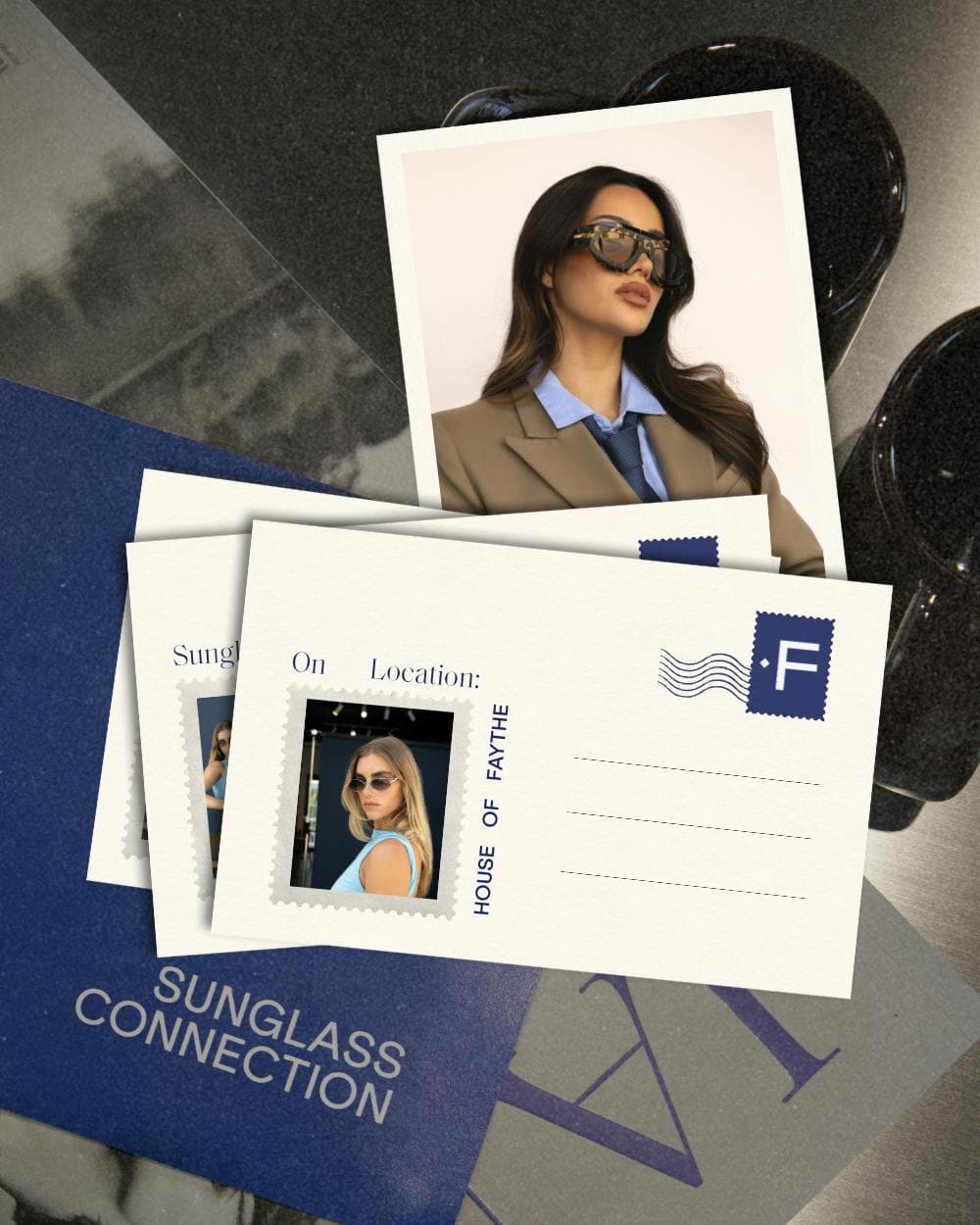 A set of custom postcards featuring a photo of a woman wearing  bottega veneta sunglasses, arranged on top of a blue 'Sunglass Connection' branded booklet on a dark textured surface.