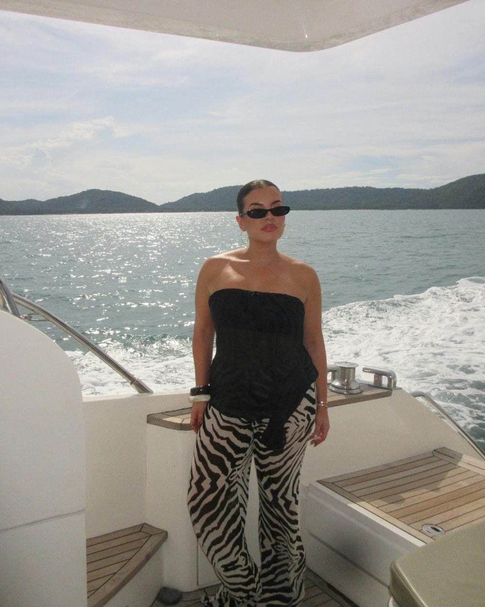jaz hand wears saint laurent sunglasses